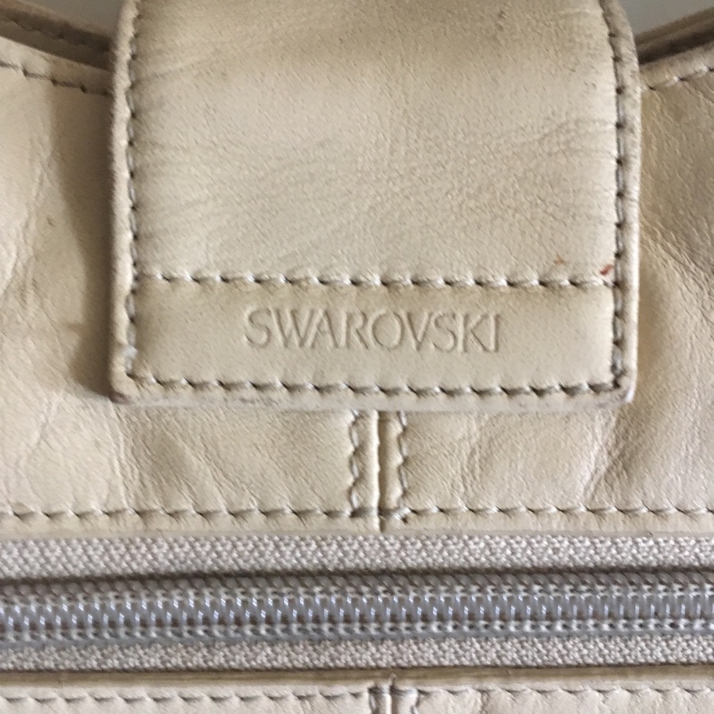 Light beige beautiful bag bought from Swarovski